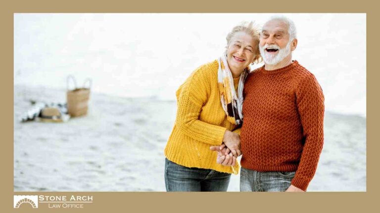 Older couple on beach happy they have a revocable living trust in Woodbury, MN